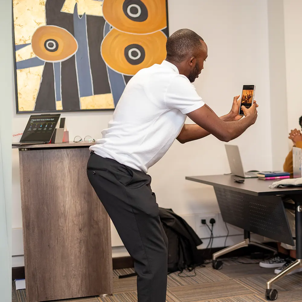 Elvis building a website during a training session